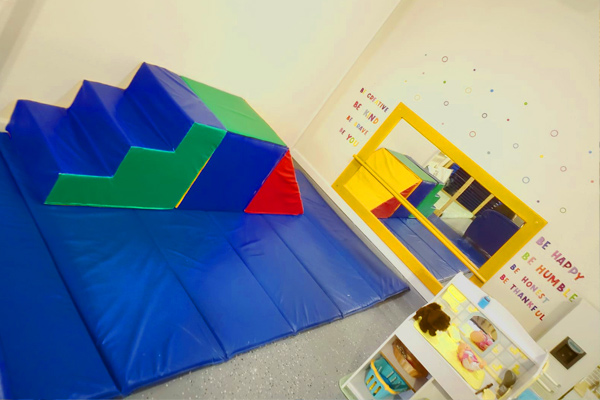 Soft play foam blocks and safe learning area at Bloom Early Learning Academy